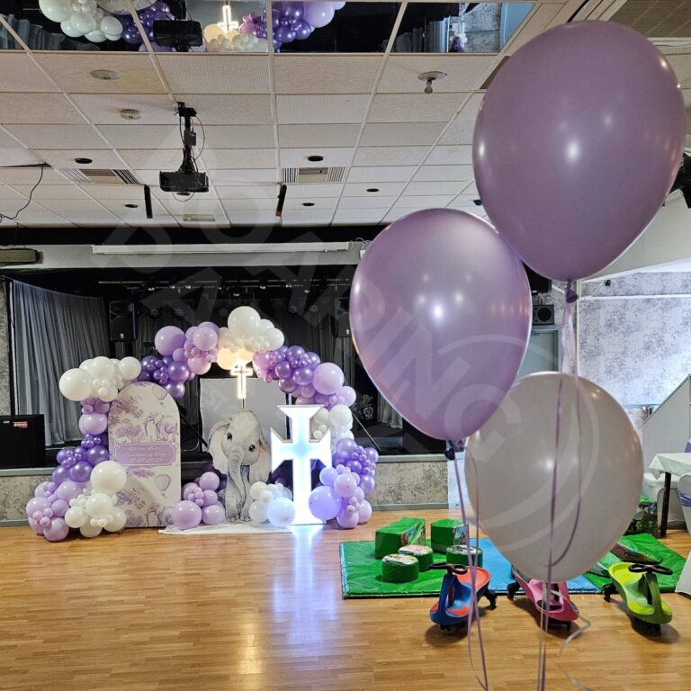 Custom Christening Venue dress including personalised backdrops, light up cross and table clusters.