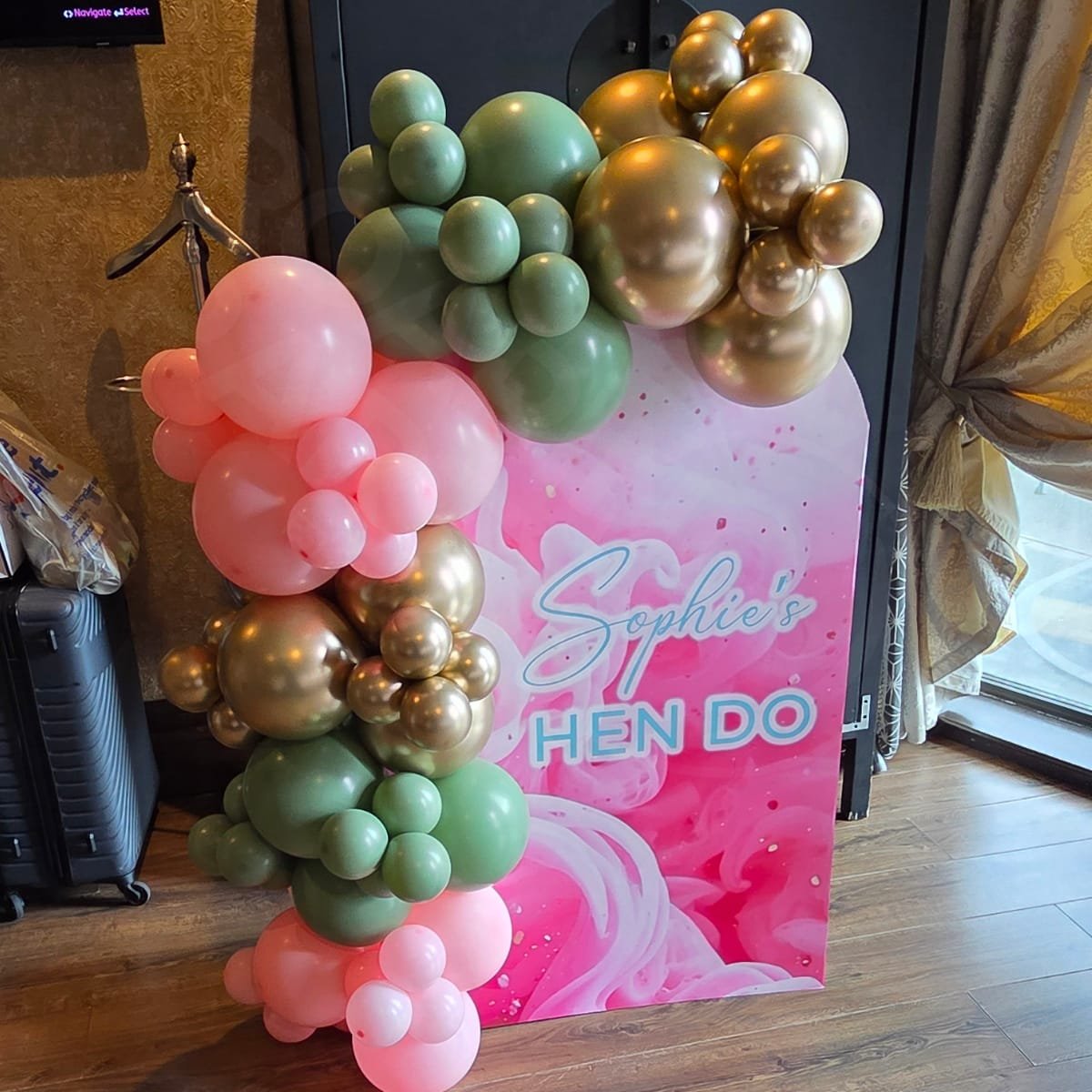 A 4ft Personalised Arch Board with balloon garland in a first floor Shankly Hotel Room for a hen party in Liverpool