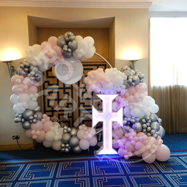 The Deluxe Christening package at Crowne Plaza Liverpool with Light Up cross, hoop and balloon garland