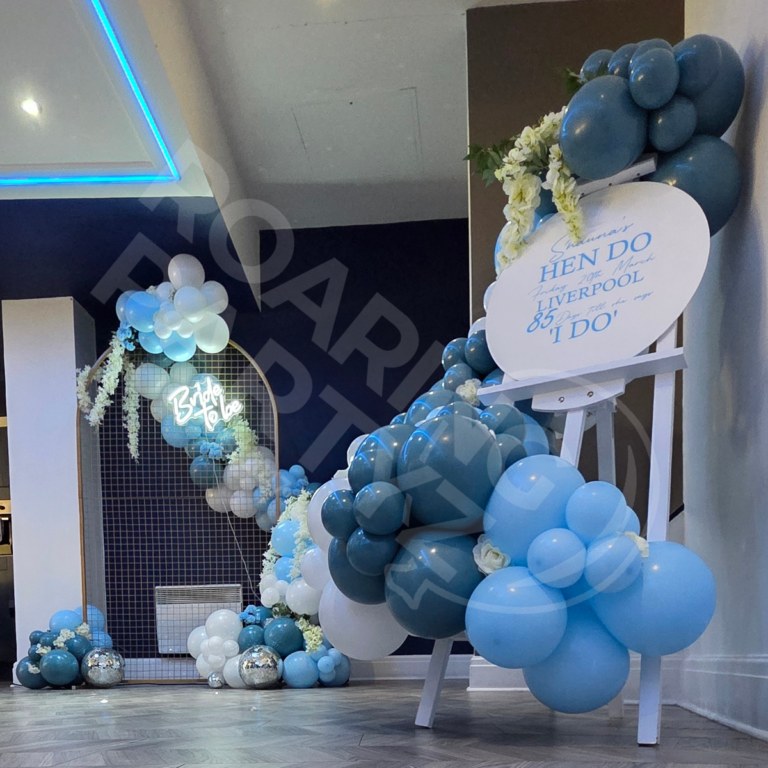 Hen party decor with disco balls and flowers