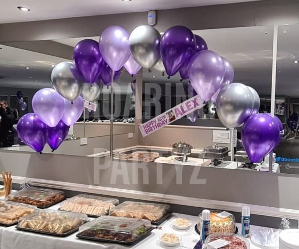 Purple and silver buffet arch at Bootle Football Club